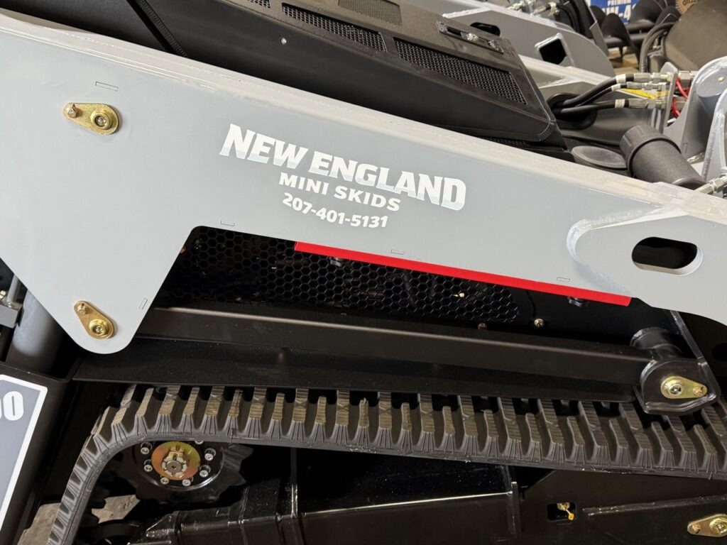 NE MiniSkids Labeled Machine